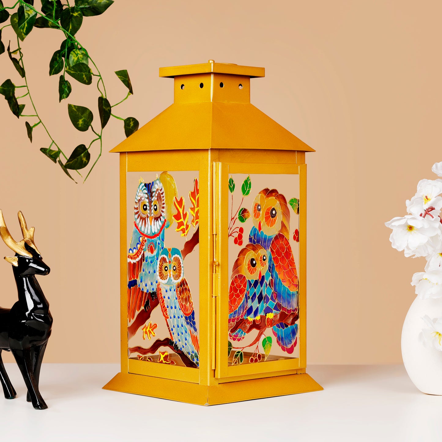 Mystic-Hoot-Lantern-featuring-owl-design-in-high-quality-glass-and-metal.jpg