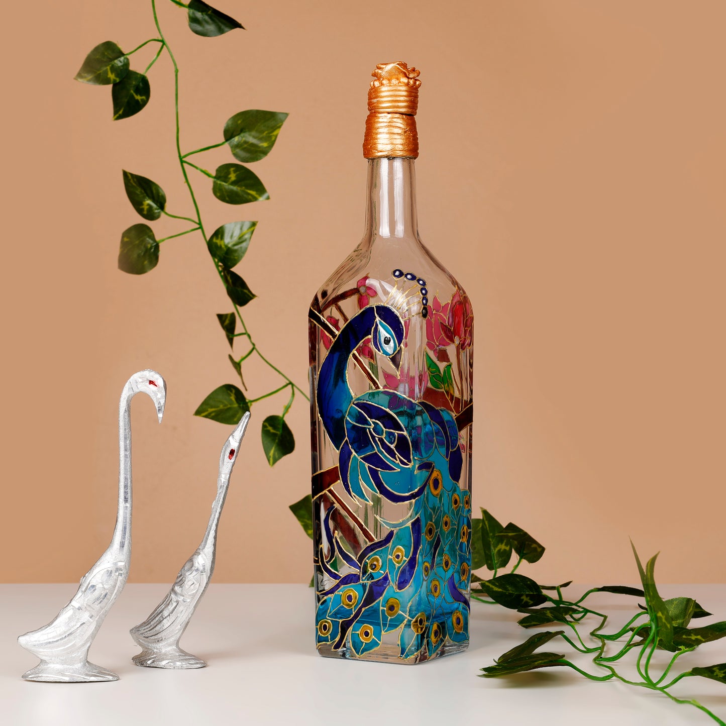 Hand-painted-stained-glass-bottle-featuring-peacock-design-on-branch.jpg