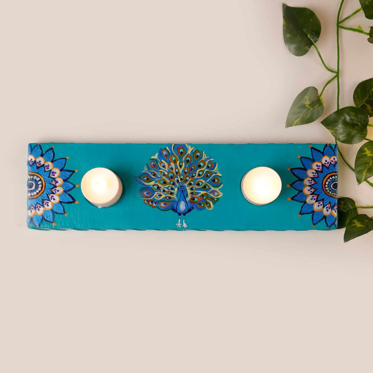 Side-view-of-GlowingPlumes-Tea-Light-Holder-focusing-on-resin-glaze-finish.jpg