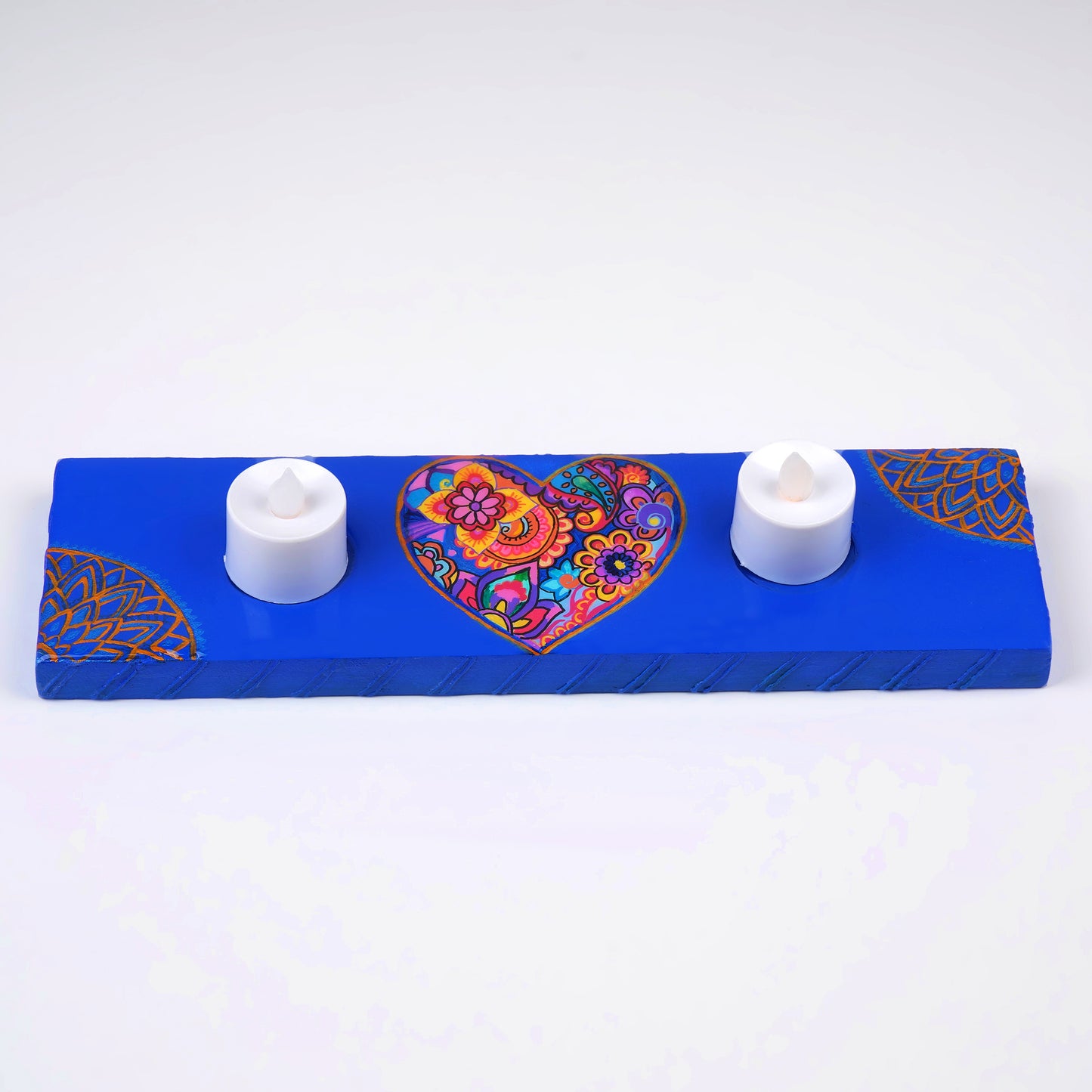 Heart-Maze-Tea-Light-Holder-with-intricate-hand-painted-wooden-design.jpg