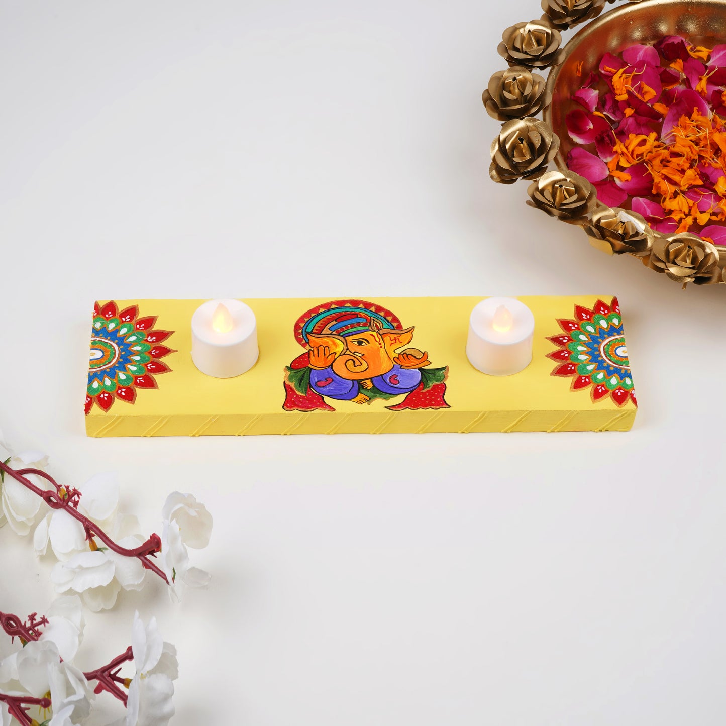 A side angle displaying the holder's solid wood construction and detailed artwork.