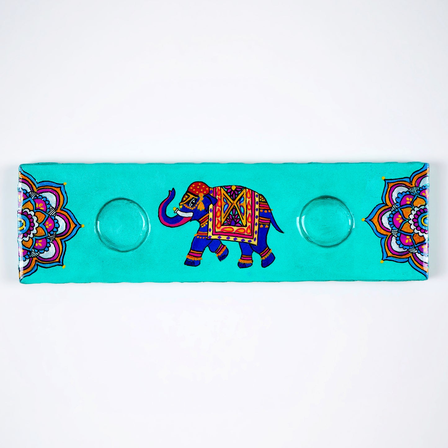 Close-up-view-of-Tej-Tea-Light-Holder-showcasing-resin-glaze-finish.jpg