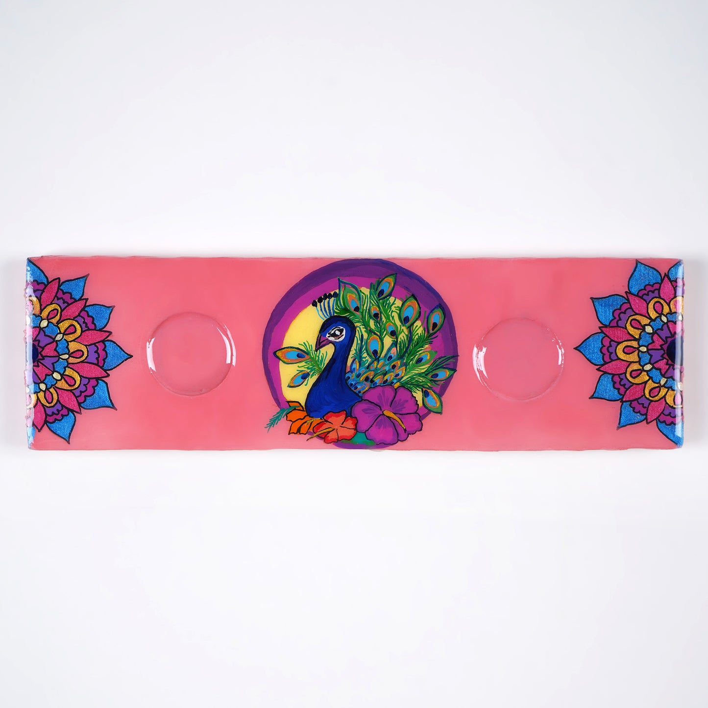 Tropicana-Tea-Light-Holder-with-intricate-feather-details.jpg
