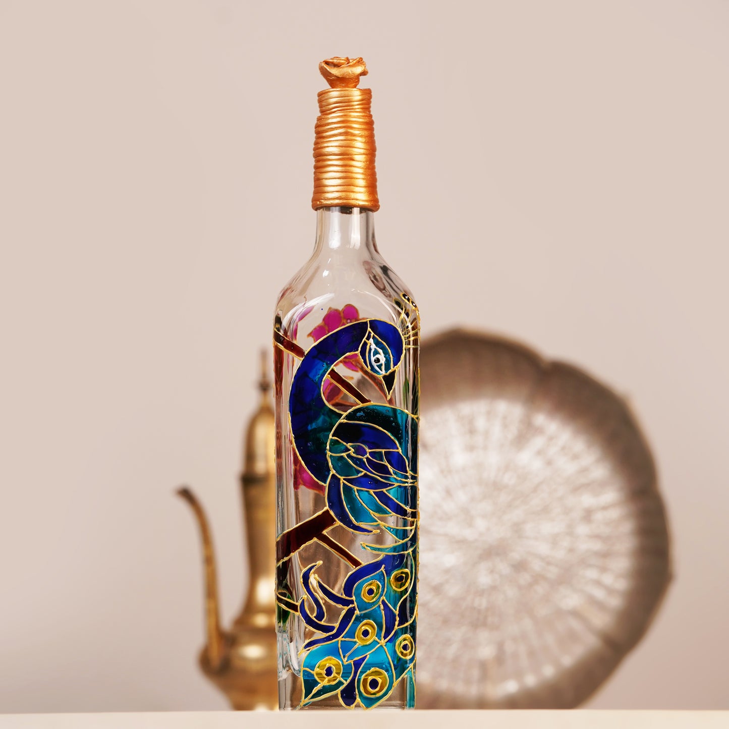 Full-view-of-iridescent-peacock-bottle-lamp-with-intricate-artwork.jpg
