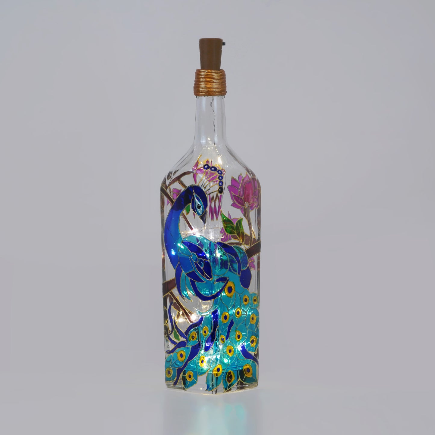 Handcrafted-cork-on-peacock-themed-glass-bottle-lamp.jpg