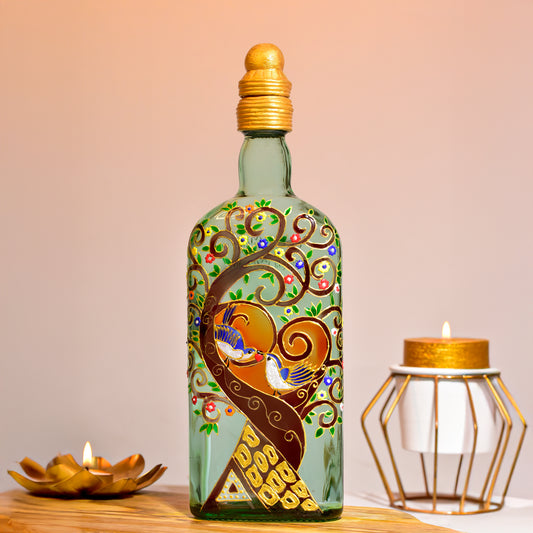 Hand-painted-glass-bottle-lamp-with-intricate-stained-glass-design-of-a-tree.jpg